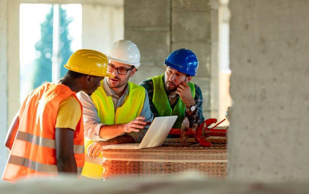 Construction workers discussing